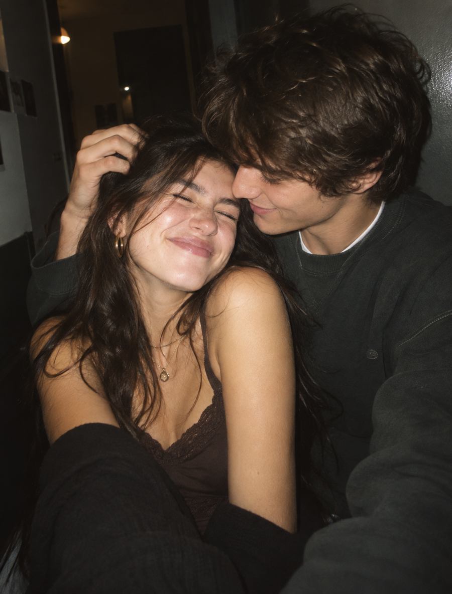 A couple sharing a close, happy moment